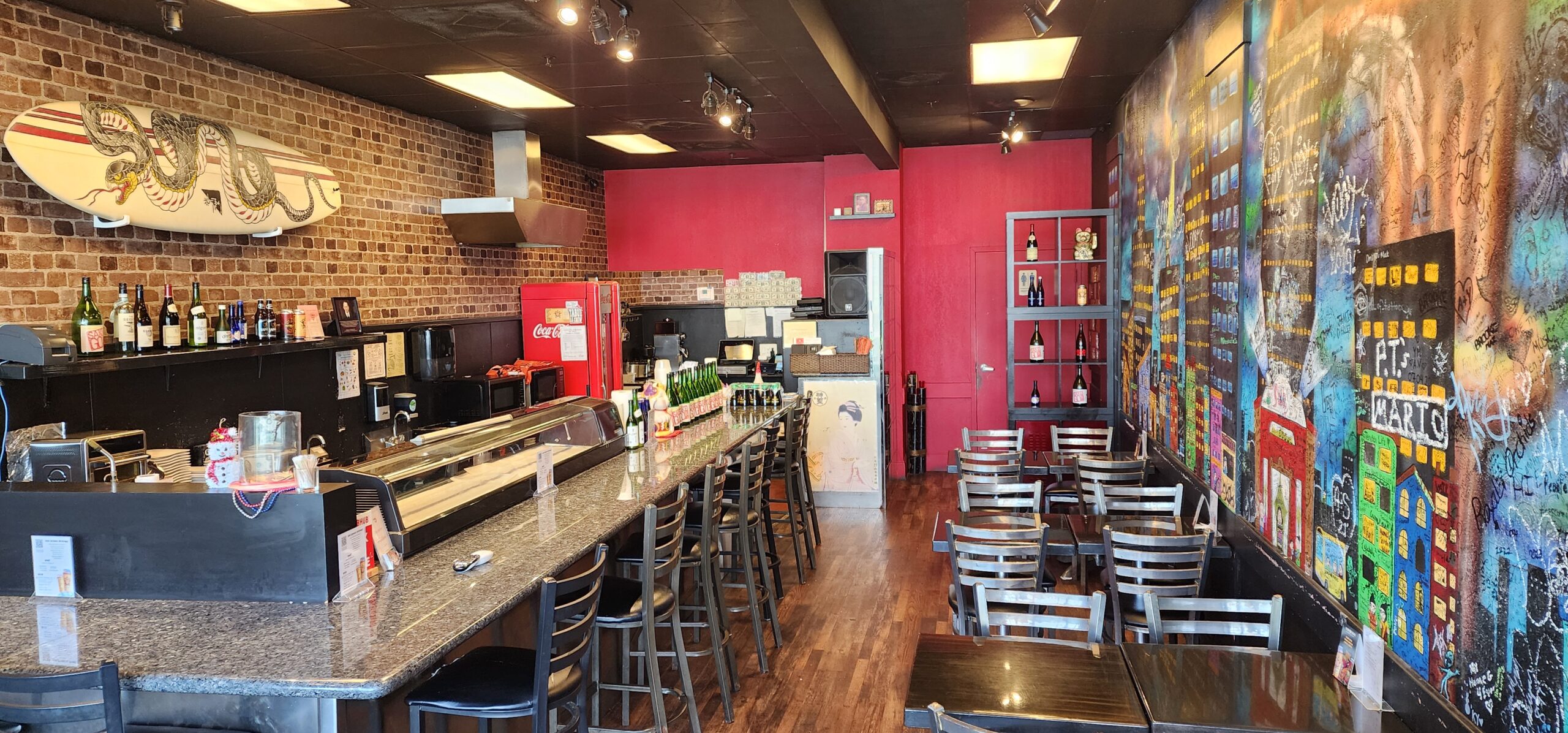 People cheering whine glasses at a table